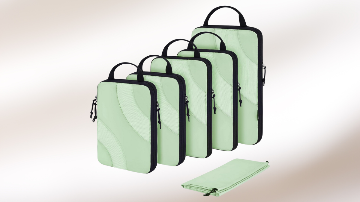A set of light green travel organizer pouches with sleek black handles and zipper accents. The collection includes multiple sizes for versatile packing and organization, displayed neatly against a soft gradient background, emphasizing their stylish and practical design.