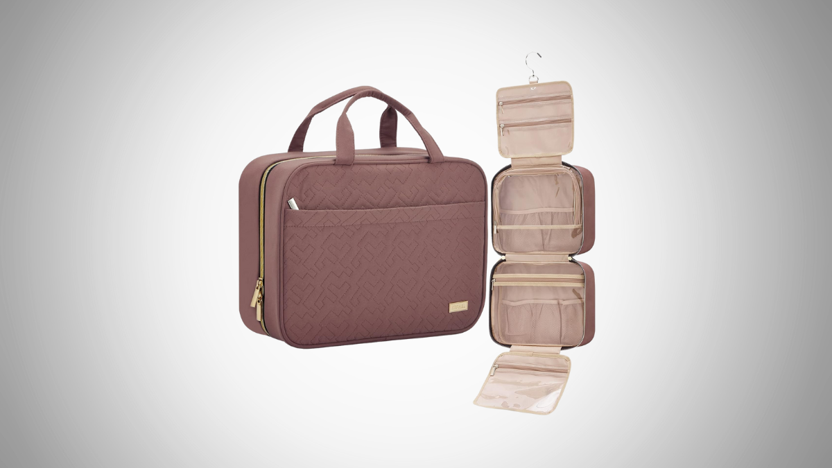 Elegant maroon travel toiletry bag with a compact handle design, featuring an open view of multiple organized compartments and a built-in hanging hook.