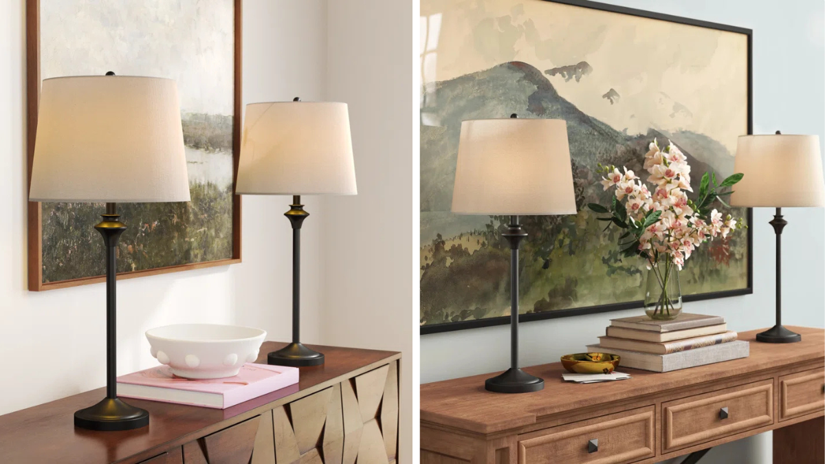 Elegant table lamps with classic black bases and neutral lampshades, styled on wooden console tables, complemented by landscape art and decorative accents.