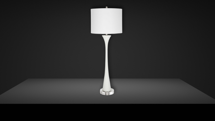 A sleek, modern table lamp with a tall, slender white base and a round fabric shade, standing on a smooth surface against a dark background.