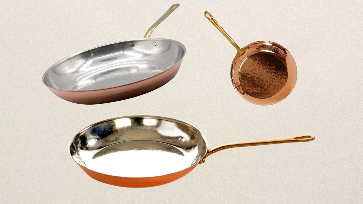 Three CREARTISTIC handmade copper frying pans with brass handles and tin-lined interiors are displayed against a neutral background.