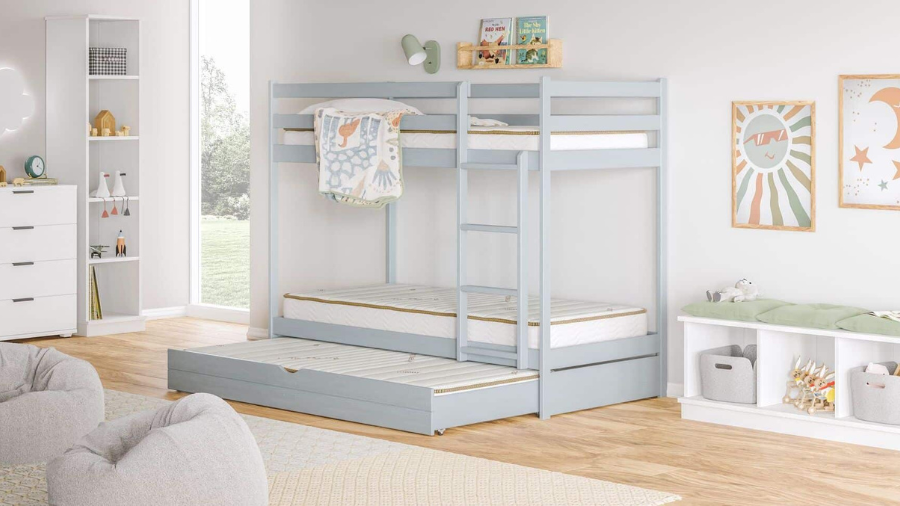 Light blue bunk bed with a pull-out trundle bed in a stylish, kid-friendly room with soft furnishings and playful wall art.