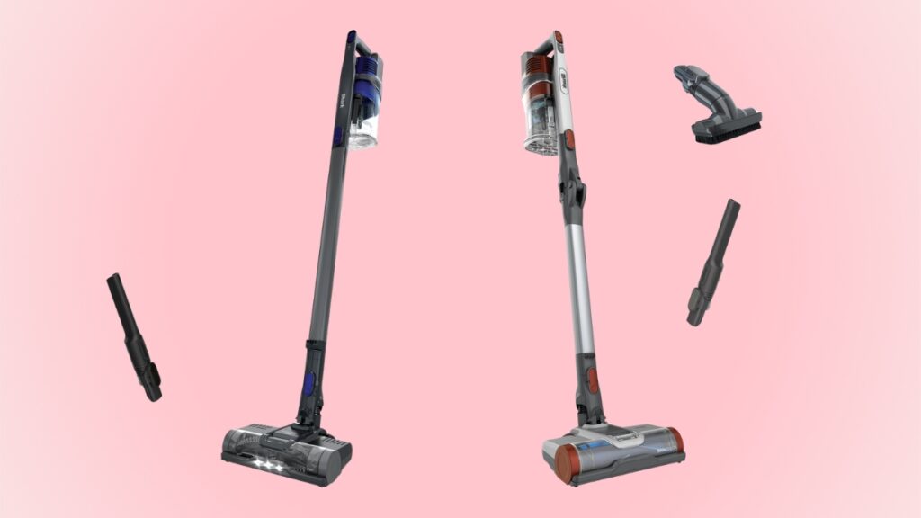Two Shark Pet Cordless Stick Vacuums with a pink background.