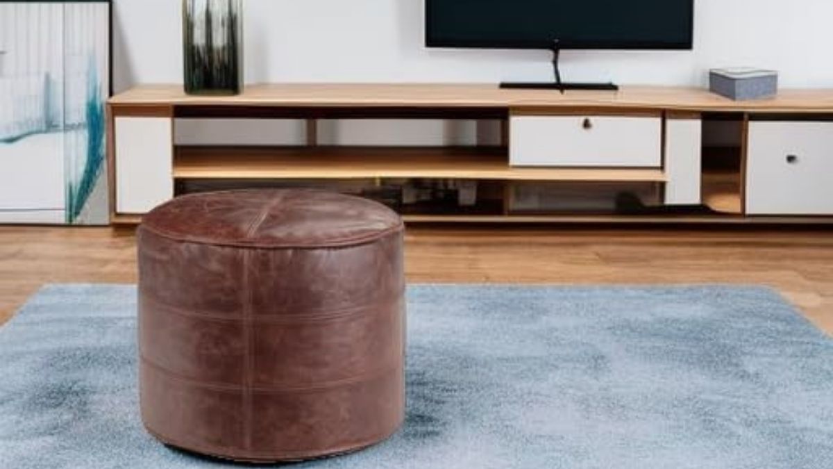 SIMPLIHOME Connor Round Pouf: A Genuine Leather Accent That Elevates Everyday Living